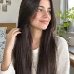 Straight hair looking light and smooth after a simple wash-to-style routine.